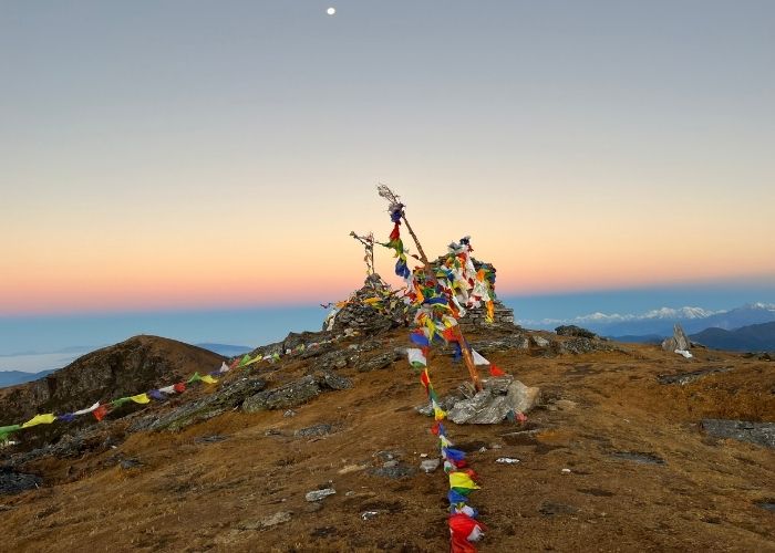 The Pikeay Peak trek's breathtaking scenery has a spectacular snow-capped mountain peak encircled by pure alpine wilderness, twisting routes, lush green valleys, and dramatic rocky cliffs, all of which beckon travellers to discover the breathtaking splendour of this remote Himalayan region.